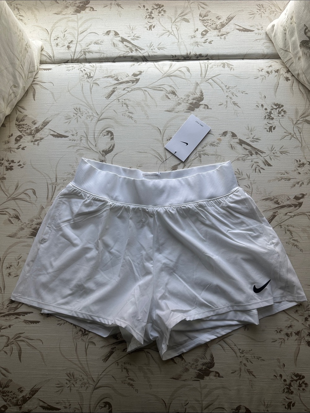 Nike White Women’s Athletic Shorts with Black Swoosh